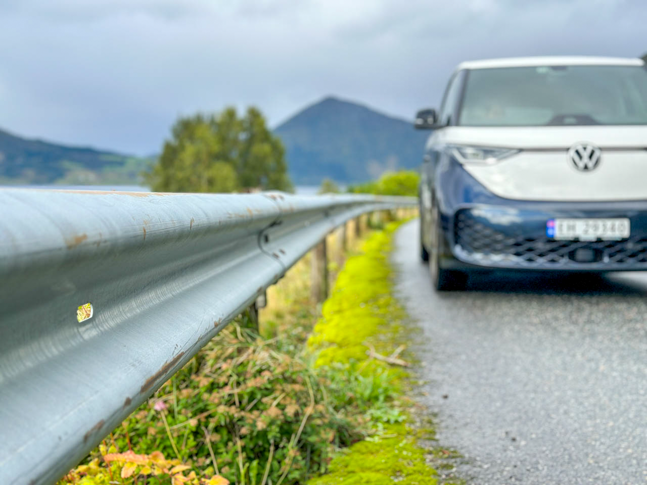 old guardrail and new electric car